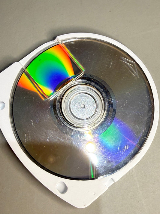 Daxter PSP UMD disc surface with visible wear
