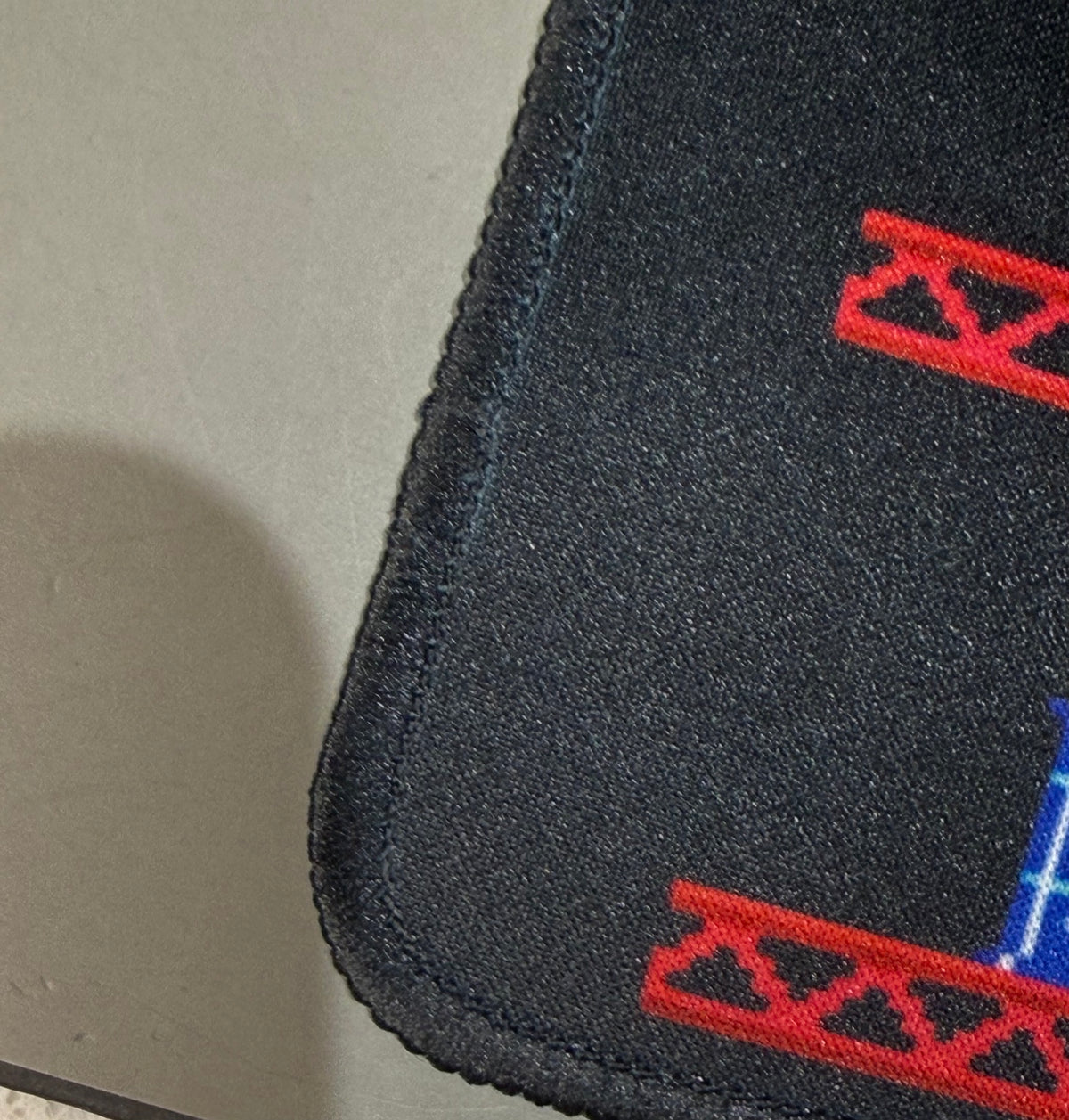 Close-up of desk mat stitched edge